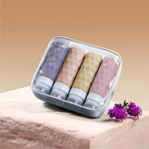 Podróżne, wielokolorowe butelki silikonowe zapakowane w kosmetyczkę - Peterson